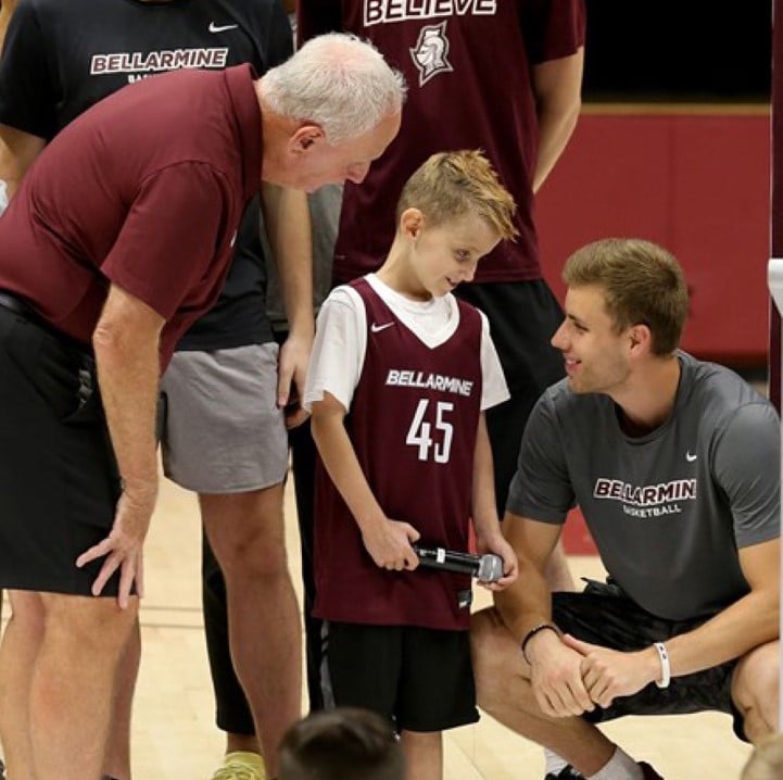 Seth talking with Bellarmine basketball coaches and team